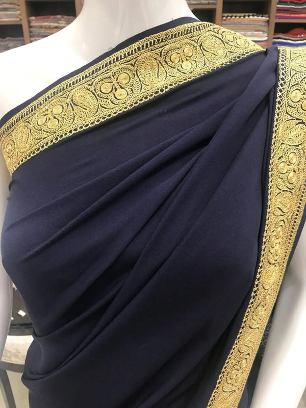 #NavyBlue saree with gold embroidery on a mannequin