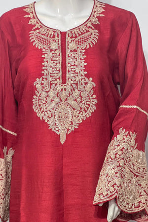 #Red embroidered kurta on a mannequin against a white background