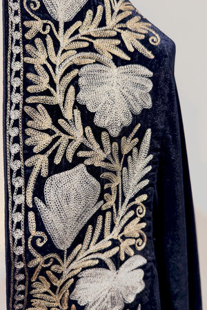 #NavyBlue fabric with gold floral embroidery on a white background