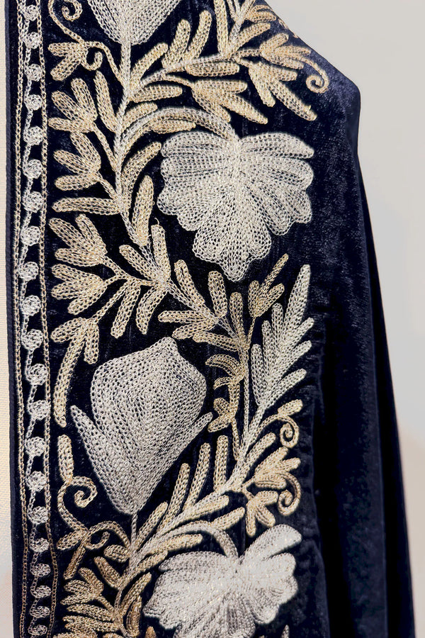 #NavyBlue fabric with gold floral embroidery on a white background